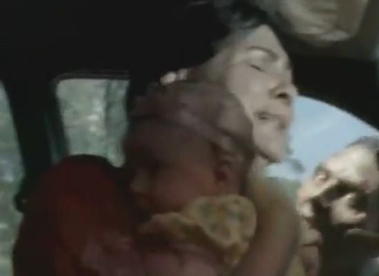 The Walking Dead woman holding the baby