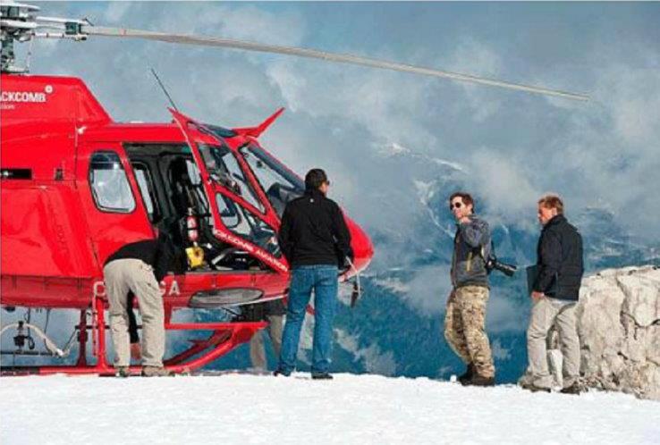 MAN OF STEEL filmmakers, stars, around a helicopter.