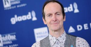 American Horror Story Star Denis O’Hare Teases Season 10 Character