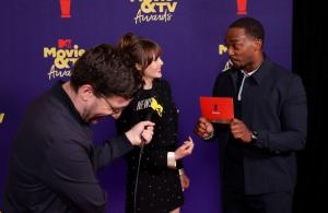 Scarlet Witch Actress Elizabeth Olsen Photo Bombs Captain America Anthony Mackie at MTV Movie & TV Awards