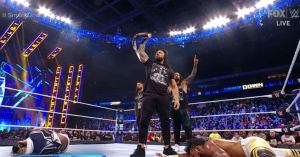 WWE: The Usos Saved from Kneeling to King Woods by Roman Reigns Onslaught on SmackDown