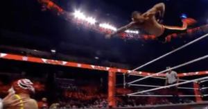 Watch: Montez Ford Nailed a Superman Pose While Diving During a WWE Raw Tag Team Match