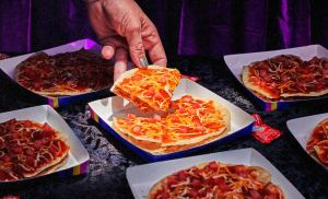 Everyone’s Ecstatic Taco Bell’s Bringing the Mexican Pizza Back for Good