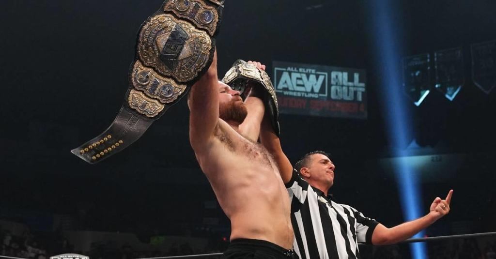 aew-jon-moxley-world-champion-cm-punk.jpg