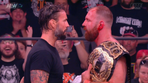 CM Punk Returns on AEW Dynamite, Confronts Jon Moxley