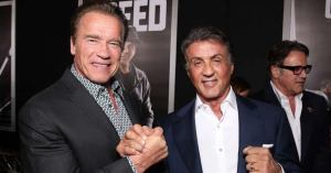 Arnold Schwarzenegger and Sylvester Stallone Carve Pumpkins for Halloween