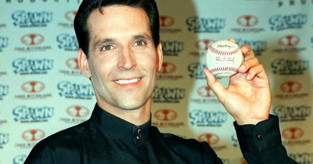 Todd McFarlane holds Mark McGwire's 70th home run