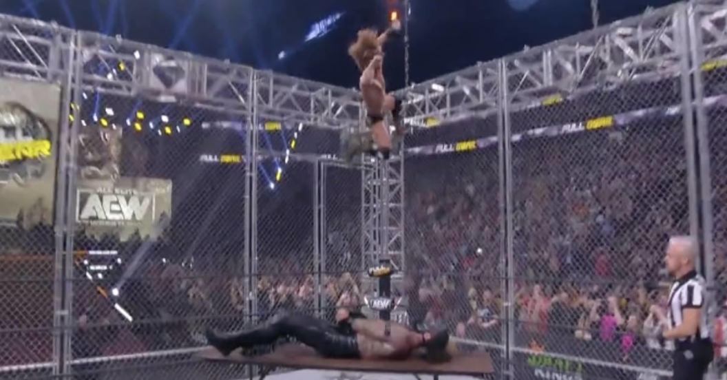 aew-jungle-boy-steel-cage-elbow-drop.jpg