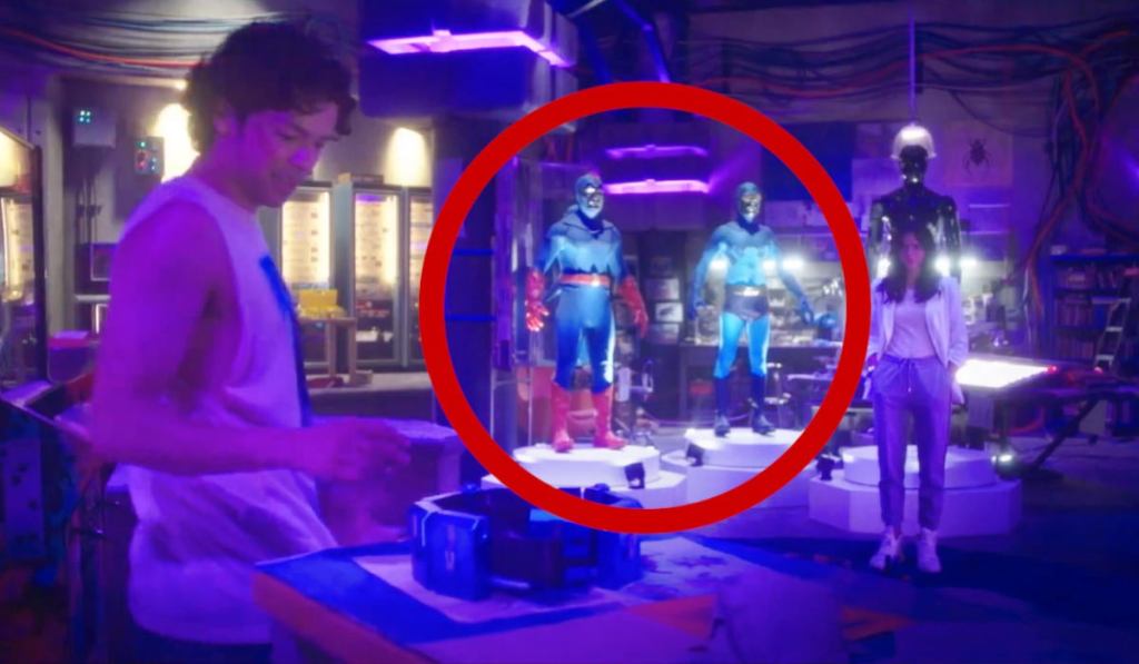 blue-beetle-trailer-easter-eggs-ted-kord-dan-garrett-costume-suits.jpg