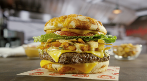 Wendy’s New Loaded Nacho Burger and Queso Fries Unveiled