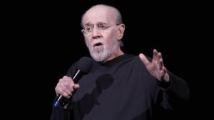 George Carlin’s Daughter Slams AI-Generated Comedy Special, “No Machine Will Ever Replace His Genius”