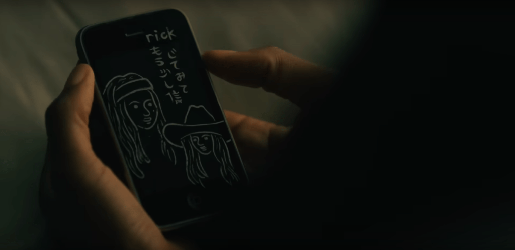 the-walking-dead-rick-michonne-phone.png