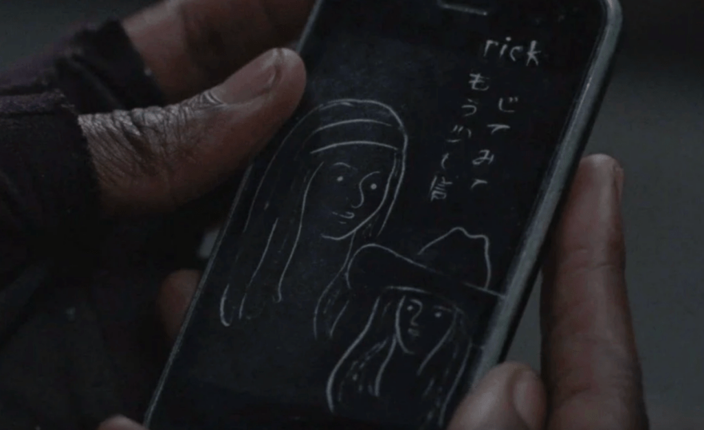 the-walking-dead-michonne-rick-phone.png