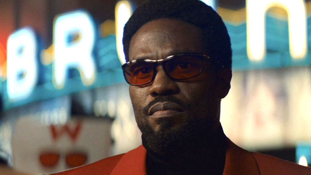 Yahya Abdul-Mateen II in Wonder Man wearing red glasses