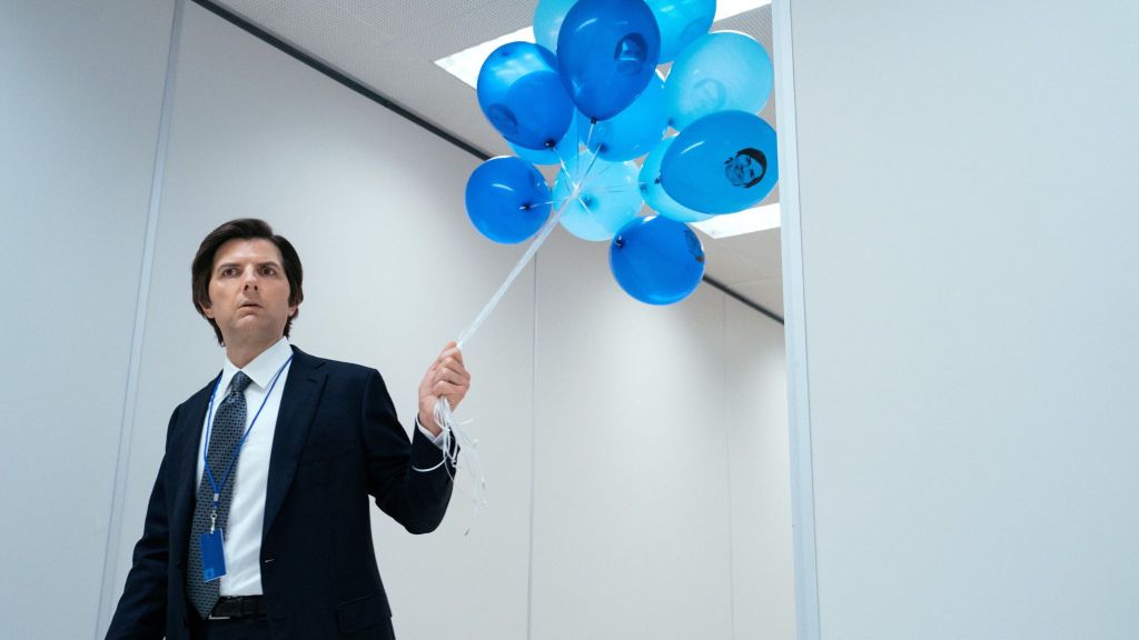 Adam Scott holding balloons in Apple TV+'s Severance