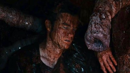Jack Quaid as Hughie Campbell covered in blood inside Lucy the Whale in The Boys