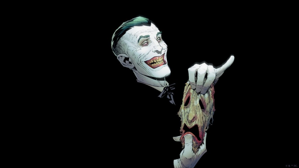 The Joker holding his decomposing face skin from Batman: Endgame