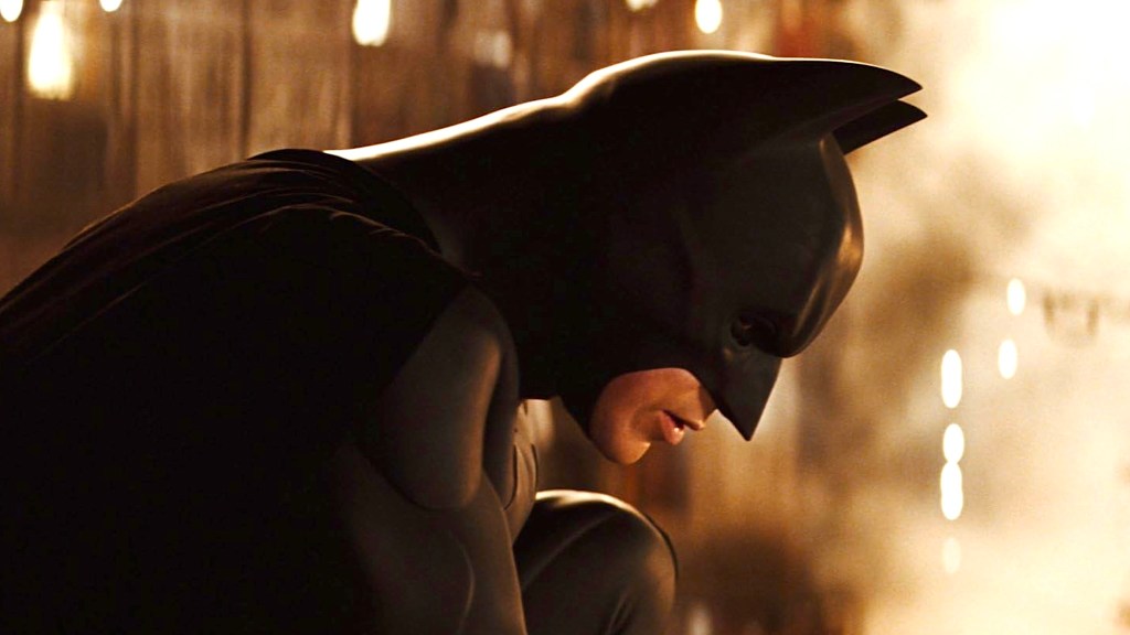 Side profile of Christian Bale's Bruce Wayne aka Batman.