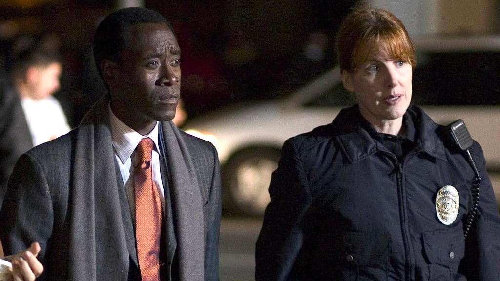 Don Cheadle and Kathleen York in Crash