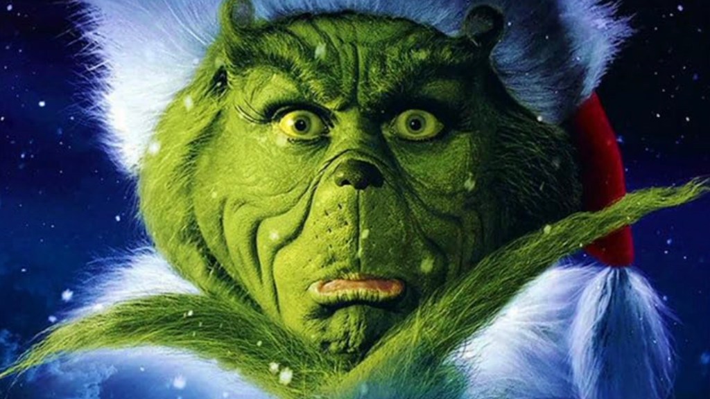 Closeup of Jim Carrey's the Grinch on How the Grinch Stole Christmas poster