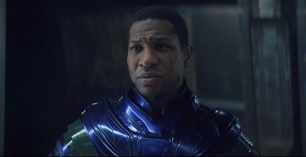 Jonathan Majors as Kang the Conqueror wearing purple and green armor