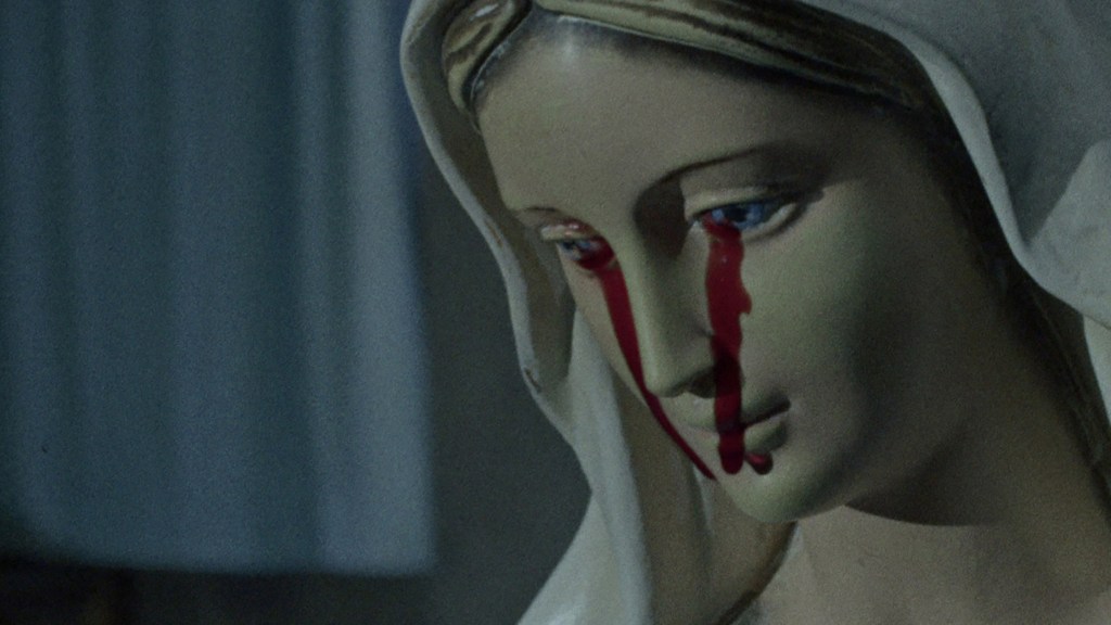 A bleeding statue of Mary in The Devil's Doorway