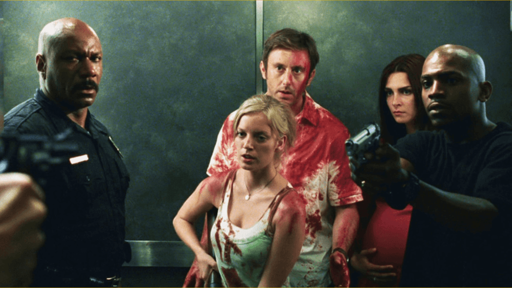 The cast of Dawn of the Dead prepare to fight a zombie attack. 