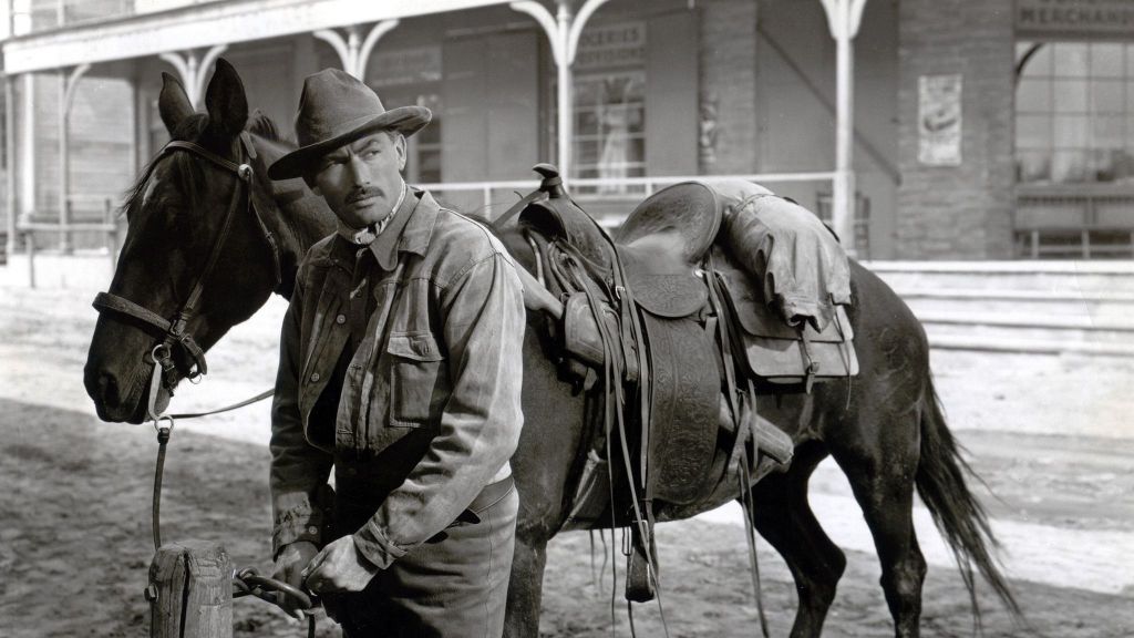 Gregory Peck with his horse in the Western The Gunfighter