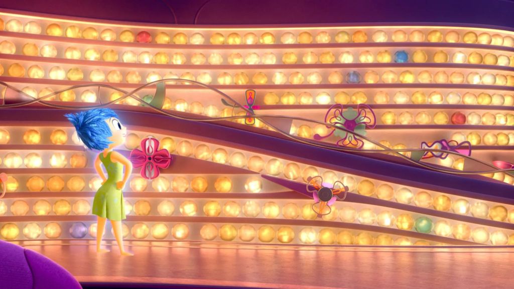 Joy in front of a wall of memories in Pixar's Inside Out