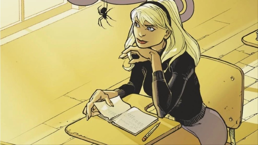 Gwen Stacy sentado en una oficina, mirando una araña