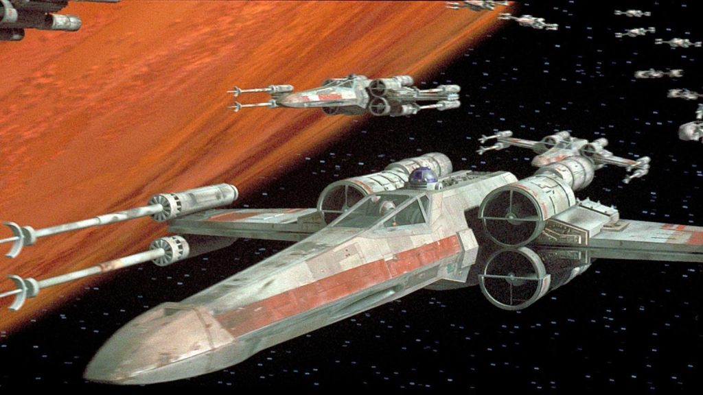 The X-Wings of Red Squadron flying past Yavin in Star Wars: Episode IV: A New Hope