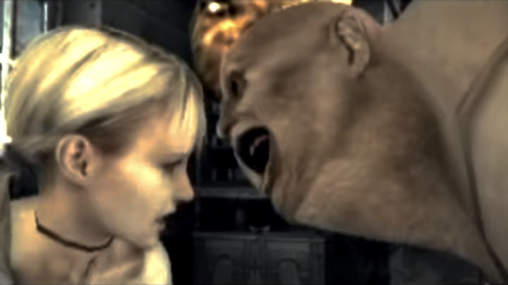 Profile shot of Debilitas opening his mouth towards Fiona's face