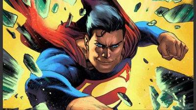 Superman punching through the wall from the cover of Superman Unliited