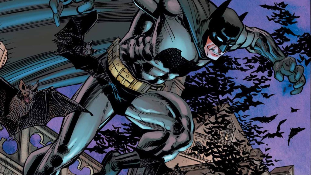 Batman surrounded by bats as he gets ready to jump off a rooftop in Gothic