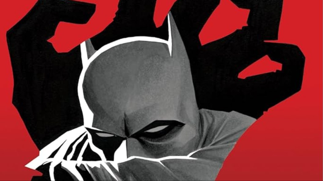 Batman's head inside a black hand