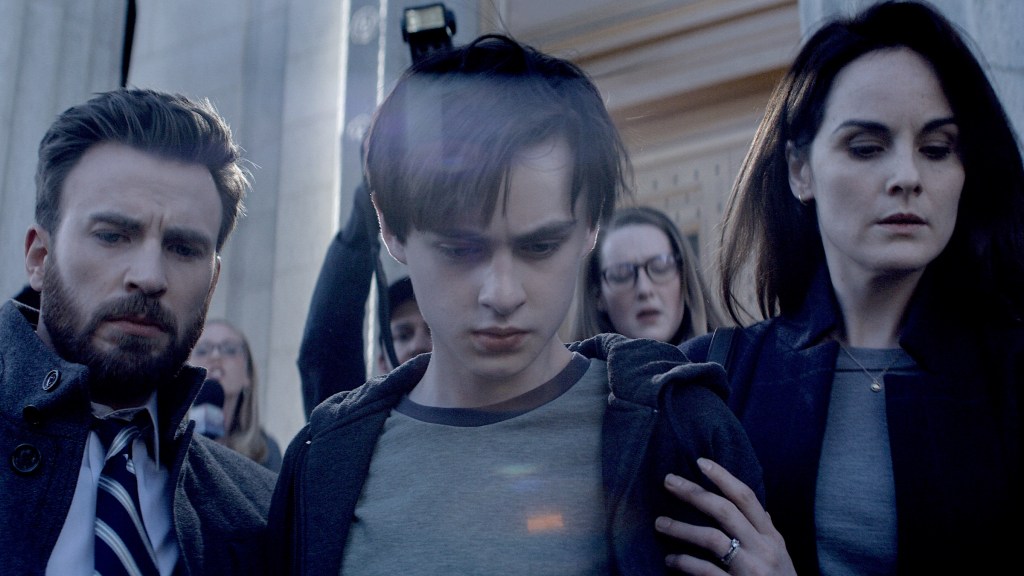 Chris Evans, Jaeden Martell, and Michelle Dockery in Defending Jacob