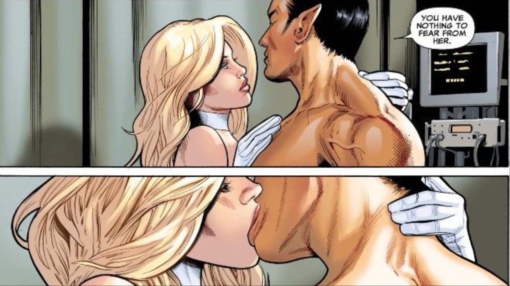 Namor holding Emma Frost and kissing her