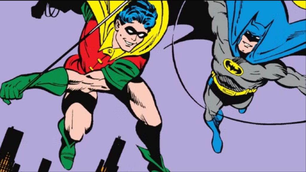Jason Todd as Robin swinging through the sky with Batman