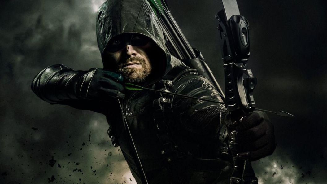 Oliver Queen holding his bow in Arrow.