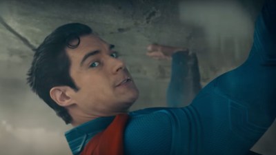 David Corenswet Superman lifting rubble