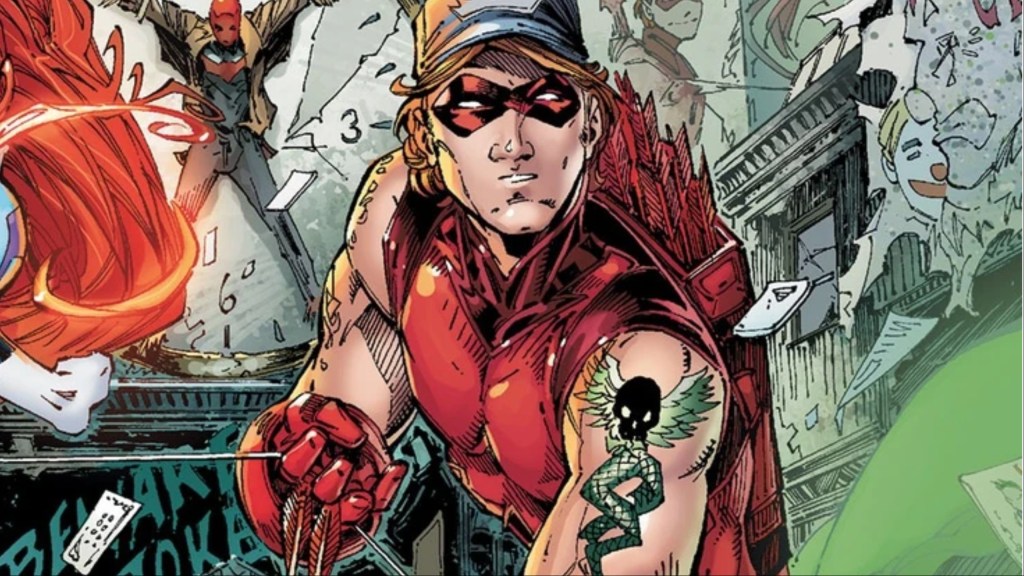 Roy Harper in his trucker cap holding his bow