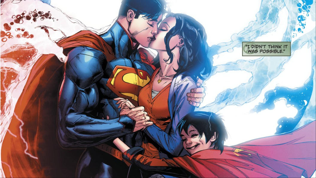 Superman kissing Lois Lane while Jon comes in to hug both of them