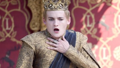 Joffrey grabbing his throat after being poisoned in Game of Thrones