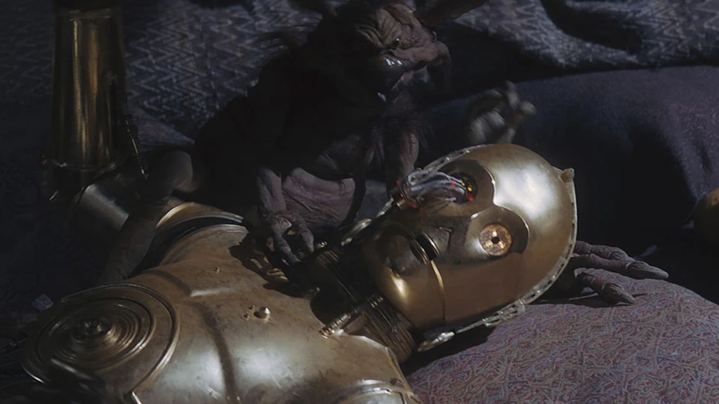 Salacious Crumb attacking C-3PO