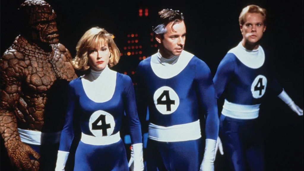 Michael Bailey Smith as The Thing, Rebecca Staab as Sue Storm, Alex Hyde-White as Reed Richards, and Jay Underwood as Johnny Storm in The Fantastic Four 1994