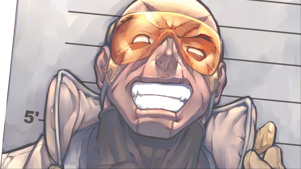 Agent X smiling in his mugshot