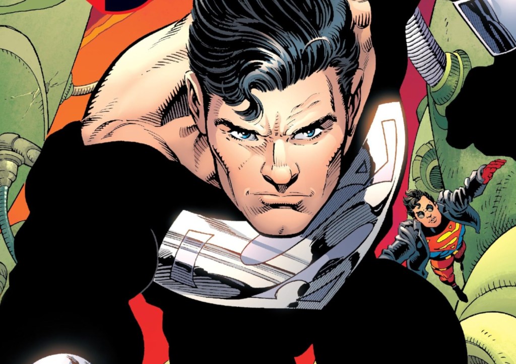 Superman in his black resurrection suit with Superboy behind him