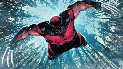 Ultimate Wolverine jumping with snowy trees behind him