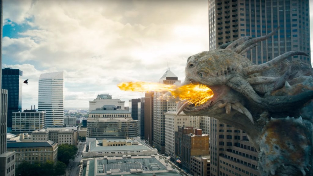 Superman battling a firebreathing kaiju in Superman (2025)
