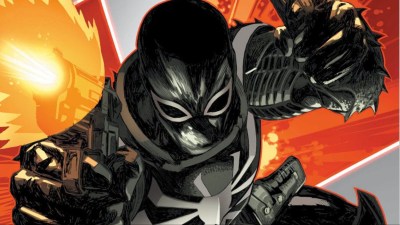 Agent Venom jumping forward and firing a gun